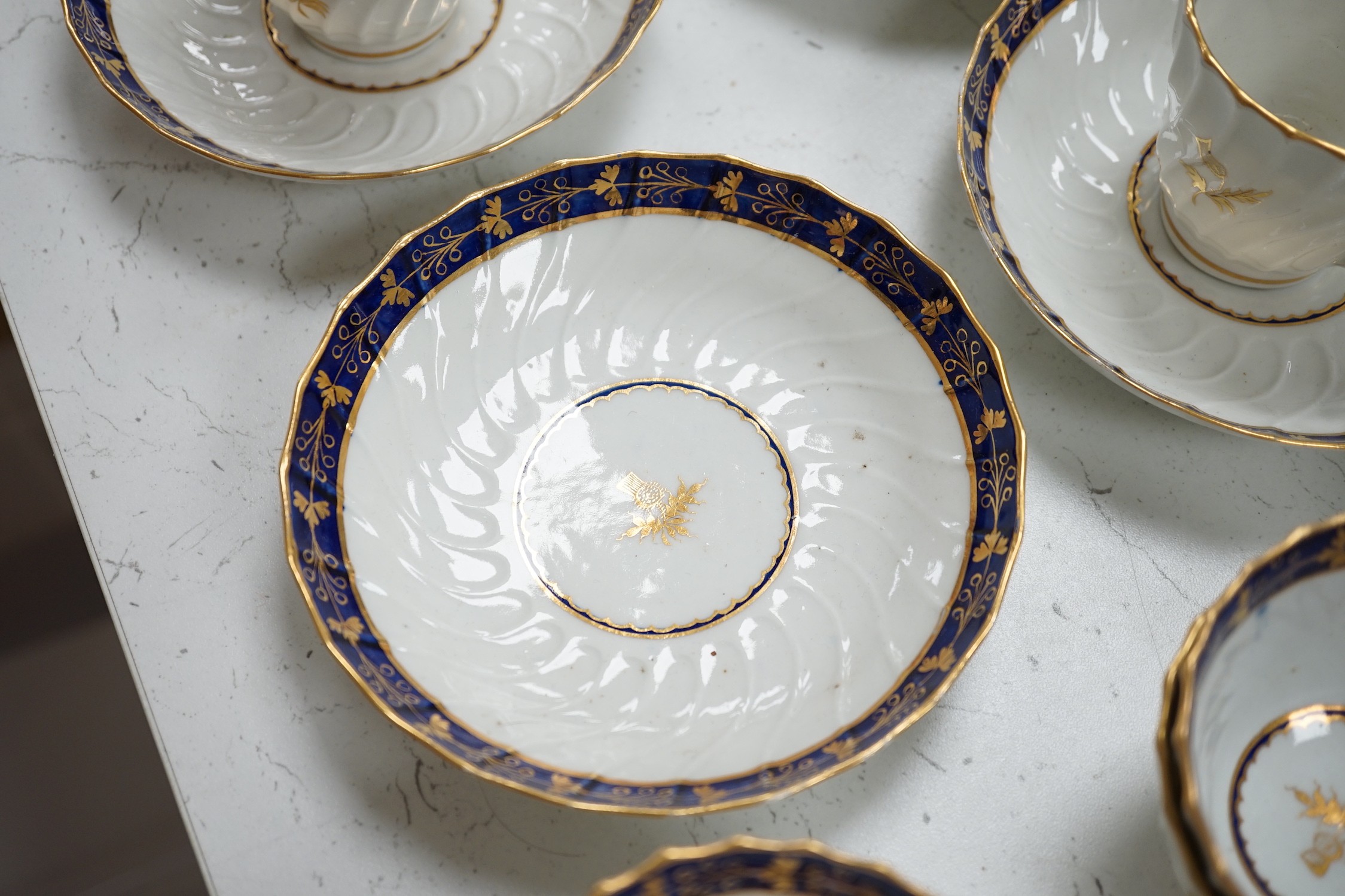 A Flight and Barr, Worcester blue and gilt bordered part tea and coffee service, c.1795, incised B marks